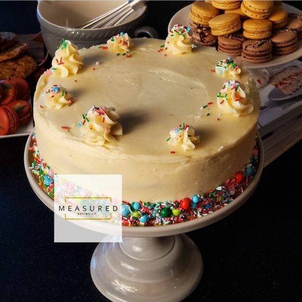 Chocolate Cake with Vanilla Buttercream, Swirls and a Band of Sprinkles